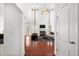 Bright living room with high ceilings, fireplace, and hardwood floors at 243 Longford Dr, Summerville, SC 29483