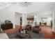 Open-concept living space with hardwood floors and access to the kitchen at 243 Longford Dr, Summerville, SC 29483