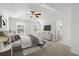 Serene main bedroom featuring a tray ceiling, ceiling fan, and ensuite bathroom at 243 Longford Dr, Summerville, SC 29483