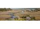 Panoramic aerial view capturing a marsh landscape with a river flowing behind a home at 2480 Royal Oak Dr, Johns Island, SC 29455