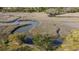 Overhead view of a marsh landscape featuring a river and lush foliage at 2480 Royal Oak Dr, Johns Island, SC 29455