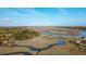 Stunning aerial view showcasing deep water access to the Stono River and Abbapoola Creek at 2480 Royal Oak Dr, Johns Island, SC 29455