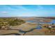 Stunning aerial view showcasing deep water access to the Stono River and Abbapoola Creek at 2480 Royal Oak Dr, Johns Island, SC 29455