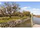 Spacious backyard with mature trees and views of the river at 2480 Royal Oak Dr, Johns Island, SC 29455