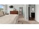 Comfortable bedroom featuring a large bed and a view into the hallway at 2480 Royal Oak Dr, Johns Island, SC 29455