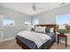 Bright bedroom with great natural light features queen bed, side tables with lamps, and scenic views at 2480 Royal Oak Dr, Johns Island, SC 29455