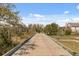 Long view of a beautiful wooden boardwalk at 2480 Royal Oak Dr, Johns Island, SC 29455