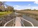 A view looking at the end of the dock to the marshlands and river at 2480 Royal Oak Dr, Johns Island, SC 29455