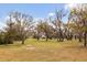 Scenic view of a home nestled among moss-covered trees and lush greenery at 2480 Royal Oak Dr, Johns Island, SC 29455