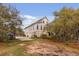 A view of the home's exterior with attached garage and a boat on a trailer at 2480 Royal Oak Dr, Johns Island, SC 29455