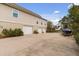 This home features a spacious three-car garage and an extensive paved driveway at 2480 Royal Oak Dr, Johns Island, SC 29455