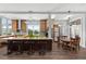 Bright, open kitchen with island seating and adjacent dining area with backyard access at 2480 Royal Oak Dr, Johns Island, SC 29455