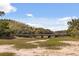 Scenic view of the wetlands with a wooden bridge at 2480 Royal Oak Dr, Johns Island, SC 29455