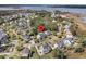 Beautiful aerial view of a charming neighborhood with waterfront homes and lush greenery at 2504 Ballast Pt, Mount Pleasant, SC 29466