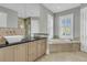 Bright bathroom featuring granite countertop, a vessel sink, soaking tub under a window, and tiled shower at 2504 Ballast Pt, Mount Pleasant, SC 29466