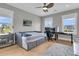 Cozy bedroom with a daybed and a workspace, featuring natural light from multiple windows at 2504 Ballast Pt, Mount Pleasant, SC 29466