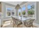 Bright dining area with large windows, pendant lighting, and views of the neighborhood at 2504 Ballast Pt, Mount Pleasant, SC 29466