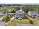 Inviting three-story home with well-manicured lawn, double porches, and stately curb appeal at 2504 Ballast Pt, Mount Pleasant, SC 29466