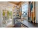 Charming bar area with a window, display shelving, and a stylish sink and countertop at 304 Bank St, Mount Pleasant, SC 29464