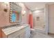 Bathroom with single vanity, granite counter tops, and shower with a decorative curtain at 304 Bank St, Mount Pleasant, SC 29464