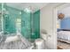Bathroom with tiled shower, glass door, and marble vanity at 304 Bank St, Mount Pleasant, SC 29464
