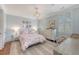 Bright bedroom with a large rug, a desk, and a comfortable bed at 304 Bank St, Mount Pleasant, SC 29464