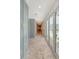Hallway features stone floors, ample storage and bright natural light at 304 Bank St, Mount Pleasant, SC 29464