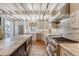 Gourmet kitchen features marble countertops, stainless steel appliances, and a large center island at 304 Bank St, Mount Pleasant, SC 29464