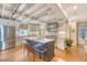 Gourmet kitchen featuring stainless steel appliances, a center island and white cabinetry at 304 Bank St, Mount Pleasant, SC 29464