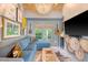 Modern living room with a blue sofa, zebra rug, and a decorative wall at 304 Bank St, Mount Pleasant, SC 29464