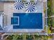 Aerial view of outdoor pool, spa, lounge area, and covered kitchen at 304 Bank St, Mount Pleasant, SC 29464