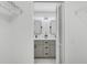 Elegant bathroom with dual sink vanity, modern mirrors, and stylish gray cabinetry at 305 Mayfield St, Summerville, SC 29485