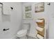 Bathroom features new toilet, brushed nickel fixtures, and built in storage at 305 Mayfield St, Summerville, SC 29485