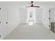 Large bright bedroom offers neutral walls, carpet, and symmetrical closet doors at 305 Mayfield St, Summerville, SC 29485