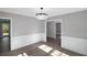Bedroom features recessed lights, chandelier, wainscoting, and wood look floors at 305 Mayfield St, Summerville, SC 29485