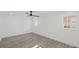 An empty bedroom with hard floors, white walls and windows at 305 Mayfield St, Summerville, SC 29485