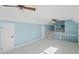 Bonus room with blue walls, a white ceiling and carpeted floor, and stairs to another level at 305 Mayfield St, Summerville, SC 29485