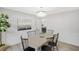 Elegant dining room with modern chandelier, wainscoting, and stylish decor at 305 Mayfield St, Summerville, SC 29485