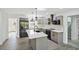 Remodeled kitchen features shaker cabinets, stainless appliances, and a large island at 305 Mayfield St, Summerville, SC 29485