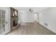 Open living room features brick fireplace and access to the backyard at 305 Mayfield St, Summerville, SC 29485