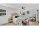 Bright main bedroom featuring ceiling fan, recessed lights, and wood look floors at 305 Mayfield St, Summerville, SC 29485