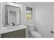 Bathroom featuring a modern vanity with marble countertop and sleek black faucet at 305 Mayfield St, Summerville, SC 29485