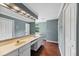 Bathroom with a double sink vanity, tile flooring, and bright lighting at 3176 Hagerty Dr, Charleston, SC 29414