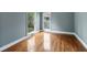 Sunlit bedroom featuring gleaming hardwood floors and serene views at 3176 Hagerty Dr, Charleston, SC 29414