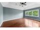 Large bedroom with hardwood floors, a vaulted ceiling, and a bright window at 3176 Hagerty Dr, Charleston, SC 29414