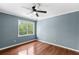 Bedroom with hardwood floors, fan, crown molding, and a bright window at 3176 Hagerty Dr, Charleston, SC 29414