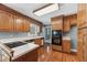 Functional kitchen featuring wood cabinets, modern appliances, and hardwood floors at 3176 Hagerty Dr, Charleston, SC 29414
