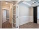 Office space features modern wainscoting and an adjacent view of the hallway at 334 Dahlia Row Dr, Summerville, SC 29486