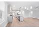 Stylish kitchen with stainless steel appliances, a center island, and modern pendant lighting at 355 Wappoo Trace Ln, Summerville, SC 29486