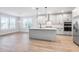 Spacious kitchen featuring a large island, modern appliances, and lots of natural light at 355 Wappoo Trace Ln, Summerville, SC 29486